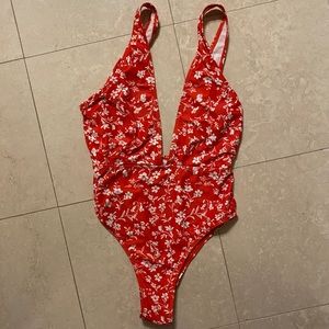red floral one piece suit